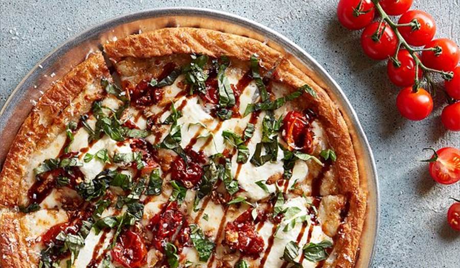 Best pizza near 76 main ink press hotel